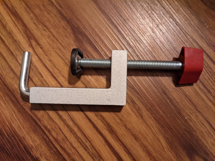 Woodworking style fence clamp